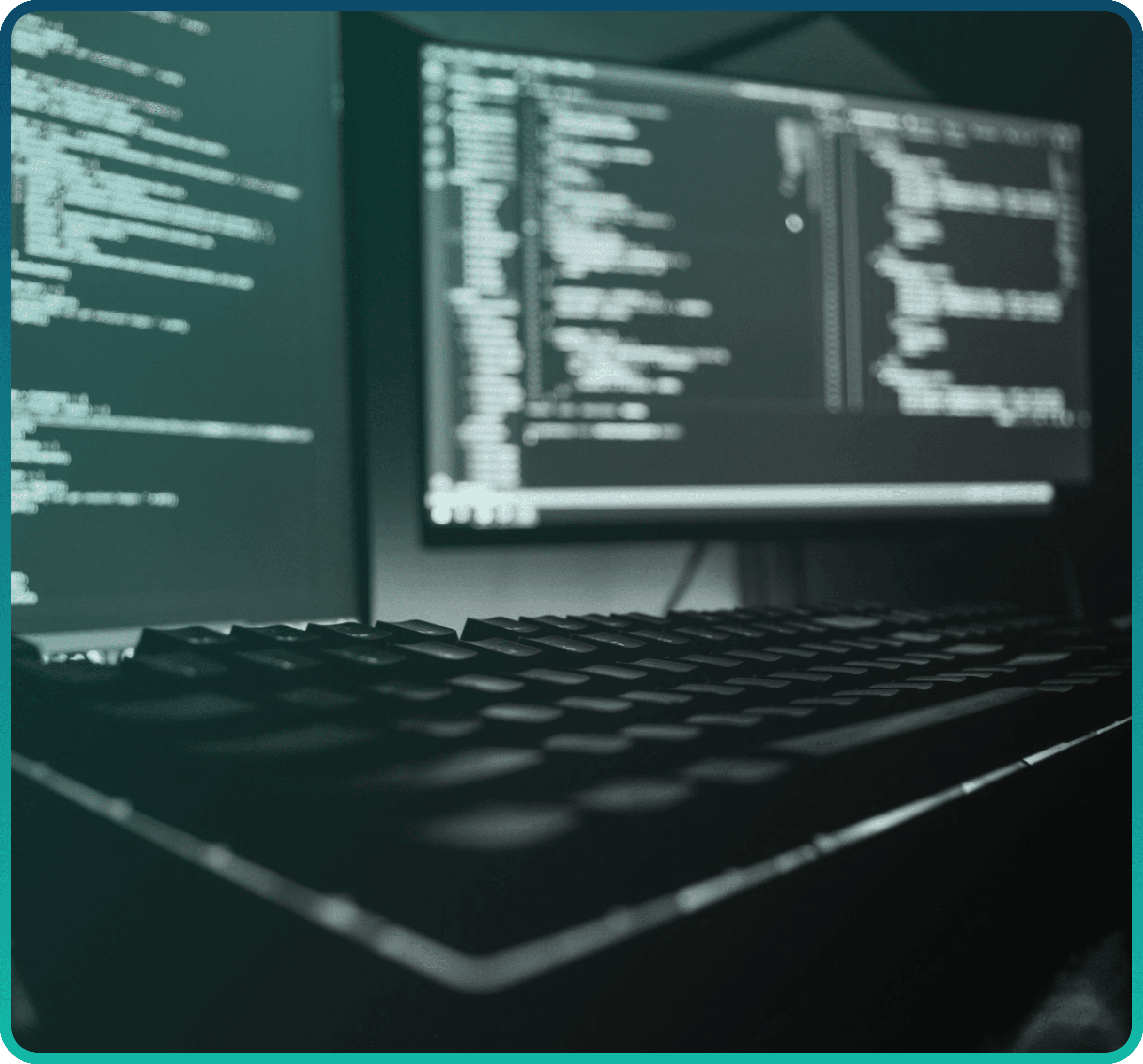 Developer workstation with code on dual monitors